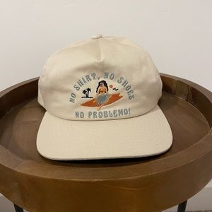 Katin no shoes, no shirt, no problemo hat